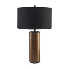 a table lamp with a black shade on the base and a gold metal cylinder at the bottom