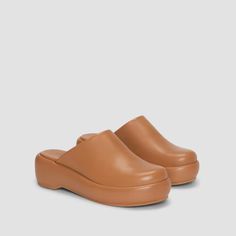 The Puffa Flatform Desert Tan – Everlane Casual Brown Leather Platform Slippers, Comfortable Leather Platform Slippers With Textured Sole, Leather Platform Slippers With Round Toe, Casual Leather Platform Slippers With Flat Heel, Leather Platform Slip-ons, Casual Leather Platform Slippers With Textured Sole, Comfortable Leather Platform Slip-ons, Comfortable Leather Platform Mules, Leather Platform Slippers With Rubber Sole And Round Toe