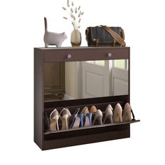 the shoe rack is holding many pairs of shoes and a purse on top of it