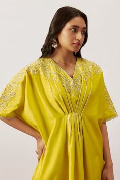 Lime green batwing sleeves kaftan with intricate zari dori blossom detailing delicately adorning the neckline, shoulders and is accentuated by the front and back pleating, - Aza Fashions Traditional Wedding Kaftan With Short Sleeves, Traditional Short Sleeve Wedding Kaftan, Traditional Short Sleeve Kaftan For Festive Occasions, V-neck Kaftan With Dabka Work For Festivals, V-neck Dabka Work Kaftan For Festivals, Elegant Short Sleeve Kaftan For Eid, Green Traditional Kaftan With Kimono Sleeves, Traditional Green Kaftan With Kimono Sleeves, Green Resham Embroidered Kaftan For Diwali