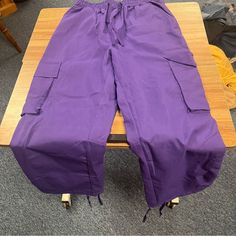 Purple Baggy Pants! Never Worn Size Small Nwot Purple Wide Leg Bottoms For Streetwear, Purple Wide Leg Bottoms With Cargo Pockets, Purple Wide-leg Bottoms With Cargo Pockets, Trendy Purple Cargo Pants With Pockets, Purple Wide Leg Cotton Pants With Pockets, Purple Cotton Wide Leg Pants With Pockets, Purple Bottoms With Side Pockets, Purple High Waist Pants For Streetwear, High Waist Purple Pants For Streetwear