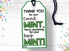 a green and white tag that says, thank you for your commit mint here's something for your first - of - fives