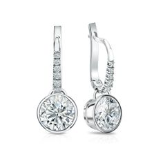 These lovely diamond dangle studs are set in a glistening platinum metal. The earrings include dazzling Round-cut lab grown diamonds with a total weight of 2.00 ct. center stone and 0.10 ct. total weight of small round-cut diamonds as side stone totaling to 2.10 ct. in a complete pair, available in lever back clasps. Radiant Diamond Earrings, Bezel Set Diamond Earrings, White Gold Drop Earrings, Black Diamond Pendant, Black Diamond Studs, Halo Diamond Earrings, White Gold Diamond Earrings, Solitaire Diamond Pendant, Colored Diamond Rings