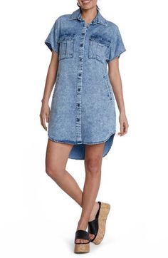 This season-staple denim dress is designed with abbreviated sleeves and a curved high-low hem. Front button closure Spread collar Short sleeves Chest button-flap patch pockets; side pockets 62% lyocell, 20% cotton, 12% polyester, 5% rayon, 1% spandex Machine wash, tumble dry Imported Summer Denim Washed Shirt Dress, Summer Washed Button-up Shirt Dress, Summer Chambray Button-up Shirt Dress, Relaxed Fit Denim Shirt Dress With Short Sleeves, Casual Short Sleeve Denim Shirt Dress, Casual Washed Shirt Dress For Spring, Casual Denim Shirt Dress With Short Sleeves, Casual Shirt Dress With Shirttail Hem And Buttons, Casual High-low Hem Shirt Dress For Spring