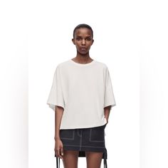 Loewe T-Shirt Colour: White Boxy Fit T-Shirt In Lightweight Cotton Jersey. Oversized Fit Short Length Crew Neck Asymmetric Front To Back Side Slits Anagram Embroidery Placed On The Chest Chic Boxy Fit Crew Neck Top, Chic Oversized Short Sleeve T-shirt, Boxy Drop Shoulder Summer Tops, Boxy Drop Shoulder Tops For Summer, Modern Boxy Crew Neck T-shirt, Chic Oversized Crew Neck T-shirt, Chic Boxy Short Sleeve Tops, Modern Tops With Relaxed Fit And Drop Shoulder, Modern Relaxed Fit Top With Drop Shoulder