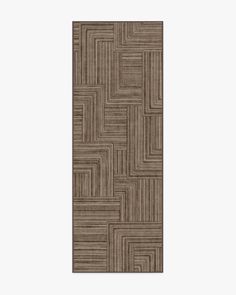 a brown rug with squares and lines on it