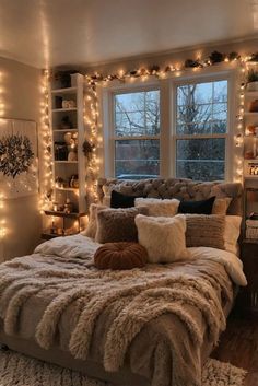 a bedroom decorated with lights and furs on the bed in front of a window