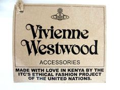 a cardboard sign that says viviene westwood accessories made with love in kenya by the it's official fashion project of the united nations