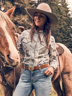 MADE TO WEAR EVERYWHERE A cowgirl can never have too many collared shirts for competition and daily life. Our Women's Wrangler Retro® All-Occasion Western Snap Dress Shirt is crafted a lightweight cotton and recycled materials blend that will keep you comfortable in everything you do. It comes with pointed yokes, pearl snaps, two chest pockets with the signature "W" stitching, and a contrast print at the cuffs. Wrangler Women, Collared Shirts, Destructed Jeans, Western Women, Loose Fit Jeans, Country Shirts, Short Shirts, Western Outfits, Denim Shop