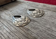 Earrings with a great 70's Southwestern Vibe!Super cool vintage Navajo Style, cast in luxurious white bronze and heavily plated in Sterling Silver. Stamp-work is hand inked, bringing the cool designs out, then finished with a silver brushed finish.2 1/4" in length measuring only the earrings2 1/2" in length including French wiresEarrings come with French wires ~ If you would like them on posts (Nickel Free) just choose POST from the "Select An Option" drop-down menuFree Shipping in the US :-) *C Vintage Pierced Jewelry For Festivals, Vintage Engraved Dangle Earrings, Vintage Brass Earrings With Engraved Details, Vintage Brass Earrings With Engraving, Stamped Dangle Jewelry, Vintage Engraved Brass Earrings, Bohemian Drop Earrings For Vintage Collection, Adjustable Stamped Dangle Earrings, Bohemian Vintage Drop Earrings