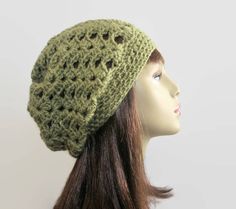 Olive green slouchy beanie. This is made to order. I crocheted this hat with a soft washable yarn. It has a slouch that you can decrease or increase depending on where you wear it on your head. If you would like it in a different color just let me know and I can have one made. Some of the other colors I have are maroon, purple, white, black, brown, gold, or blue. Please choose your size from the drop down menu. Crochet Tam, Green Beanie, Maroon Purple, Beanie Crochet, Green Crochet, Crochet Cap, Slouch Beanie, Slouch Hat, Slouchy Hat