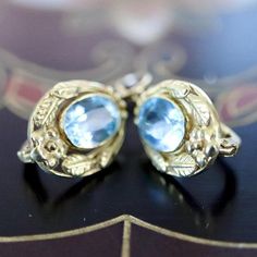 Victorians love Romantic settings such as this 14k gold floral openwork oval holding a dazzling blue topaz.  European backs for pierced ears. Oval Topaz Earrings For Formal Occasions, Formal Oval Topaz Earrings, Gold Oval Blue Topaz Earrings, Romantic Settings, Replica Jewelry, Lapis Earrings, Love Romantic, Blue Topaz Earrings, Gold And Blue