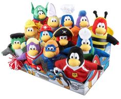 a bunch of stuffed animals are in a display box with the same characters on them