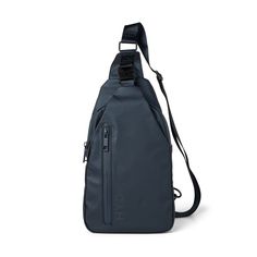 a sling bag with an adjustable shoulder strap and zippers on the side, in dark blue