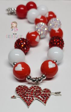 This listing is for one Double Heart Bubblegum Necklace . 20mm acrylic red solid beads. 20mm white solids 20mm red beads printed with a white heart. 20mm red rhinestone beads.  20mm white rhinestone beads.  6mm silver spacer beads. Lobster clasp with a 2 inch extender chain.   2 inch crystal double heart shaped pendant.  Available in 16, 18 or 22 inches in length. Longer lengths will have smaller beads at the end (14mm-16mm in size) Super cute!! Product color may differ slightly due to photograp Pumpkin Necklace, Shark Necklace, Double Heart Necklace, Bubblegum Necklace, Heart Shaped Pendant, Pumpkin Earrings, Bubblegum Beads, Red Beads, Chewing Gum