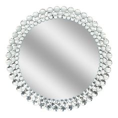 a round mirror with beads around it