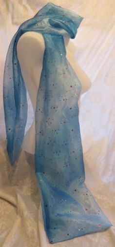 Stars scarf, Sheer Blue scarf, Shimmery Scarf, Christmas gift, birthday scarf, co-worker gift ----------- Sheer Pale Blue Shimmery Scarf with multiple colors of stars. Perfect for a night on the town. Long Scarf 72" X 18" around Infinity scarf 72" X 18" around Artsy Blue Scarf For Gift, Blue Square Scarves For Gifts, Galaxy Scarf, Cheap Blue Winter Scarf, Cozy Blue Scarf One Size, Sevierville Tn, Blue Scarf, Long Scarf, Gifts For Coworkers