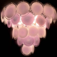 a pink chandelier hanging from the ceiling