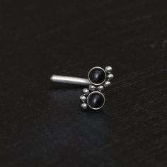 "Titanium nose stud. This listing is for a single item. ITEM MEASUREMENTS: Available gauges (thickness of post): 22g, 20g, 18g, 16g Gemstone size: 2mm Available post shapes: L-Shape, Left Screw (for left nostril), Right Screw (for right nostril) MATERIALS USED: We create this jewelry using highest quality implant grade 23 Titanium (ASTM F-136) - best choice for people with sensitive skin. However, pure titanium version can be made upon request. SHIPPING & HANDLING: We will pack your jewelry Nostril Stud, Titanium Nose Stud, Opal Nose Stud, Nostril Ring, Nose Bone, Nose Screw, Nose Earrings, Nose Bones, Nose Jewelry