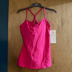 Brand New Never Worn Lucy Siren Racerback Tank With Built In Bra W/ Inserts. Color Azalea Size Large Pink Cami Top For Workout, Summer Racerback Activewear With Straps, Summer Sports Camisole, Spring Workout Tops With Adjustable Straps, Sleeveless Gym Tops With Straps, Spring Sports Tops With Straps, Spring Sports Tops With Adjustable Straps, Racerback Workout Tops With Straps, Spring Gym Tank Top With Adjustable Straps