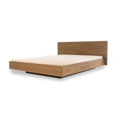 a bed with a wooden headboard and foot board on top of it, against a white background