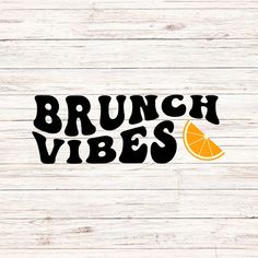 the words brunch vibes written in black and orange slices on a white wood background