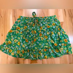 Sienna Sky Green Floral Skirt Women’s Size Medium Never Worn - Great Quality Smoke And Pet Free Household! Green Flowy Cotton Skirt, Green Floral Print Relaxed Skirt, Green Floral Print Flowy Skirt, Green Flared Skirt With Floral Print, Green Flowy Summer Skirt, Flowy Green Skirt For Summer, Bohemian Cotton Mini Skirt For Day Out, Bohemian Skirted Skort For Vacation, Green Floral Print Tiered Skirt