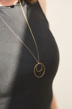 SALE Beautiful long ring/circle necklace 70cm (27,56") necklace, the pendant is about 3cm  gold plated brass - all materials are made in Germany The jewelry will be nicely packed and delivered safely. As we to want to pack our jewelry more environmentally friendly manner. We will not (unless absolutely necessary) use plastic lined envelopes and send them in simple paper envelopes.  Tips to make your jewellery last longer: Keep it dry! Do not bathe/shower or spray perfume on it - apply makeup and Gold Circular Jewelry With Adjustable Chain, Minimalist Hoop Jewelry With Adjustable Chain, Gold-tone Circle Gold-plated Jewelry, Gold-tone Circular Gold-plated Jewelry, Elegant Round Necklaces With Metal Ring, Minimalist Hoop Jewelry With Delicate Chain, Gold Circular Metal Ring Jewelry, Gold Jewelry With Adjustable Chain And Open Circle Design, Gold Plated Circle Necklace With Adjustable Chain