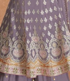 COLOR : Mauve Gray FABRIC : Top - Pure Chinon, Bottom - Pure Chinon, Inner - Santoon, Dupatta - Pure Chinon WORK : Zari, Resham Embroidery, Pearls, Heavy Sequin Work, Lace Border OCCASION : Wedding, Reception, Engagement, Party Wear, Festival READY-TO-WEAR : No STITCHING : Available as semi-stitched fabric, can be stitched using standard size option (+$20). Note: There might be a slight color variation due to lighting and flash used during photoshoot. The bright shade seen is the best closer vie Festive Purple Palazzo Set With Intricate Embroidery, Festive Purple Embroidered Palazzo Set, Semi-stitched Purple Palazzo Set With Intricate Embroidery, Multicolor Embroidered Palazzo Set For Reception, Festive Embroidered Purple Palazzo Set, Festive Purple Sets With Floral Embroidery, Festive Purple Floral Embroidery Sets, Purple Palazzo Set With Floral Embroidery For Wedding, Purple Floral Embroidery Palazzo Set For Wedding