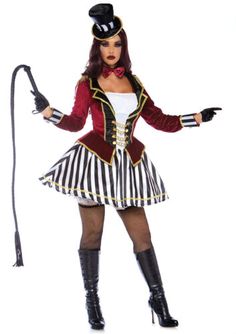 a woman dressed in a costume and holding a whip