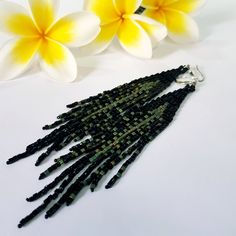 Black matt and silver color earrings. Native America beaded tassel earrings. Fringe Ombre earrings. Long earrings. Seed bead earrings. Color gradient .Waterfall earrings. Seed Beads earrings.Long dangle earrings. Beautiful,Sparkling, Elegant, Earrings .A beautiful Christmas gift for women and girlfriend. These are long but not heavy earrings. Length of earrings 14cm (4.5inches). Width of earrings 0.78 inches. To create these earrings we used seed beads of 2 shades. Materials; Luxurious Japanese Black Beaded Earrings With Tassels, Black Beaded Tassel Earrings With Round Beads, Black Beaded Fringe Tassel Earrings As Gift, Black Fringe Earrings With Round Beads, Black Beaded Fringe Dangle Tassel Earrings, Black Beaded Fringe Tassel Dangle Earrings, Black Beaded Fringe Tassel Drop Earrings, Elegant Black Tassel Earrings With Beaded Fringe, Elegant Black Tassel Earrings With Round Beads