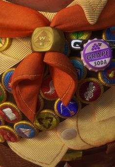 a close up of a bag with buttons and a ribbon on the top that says grape soda