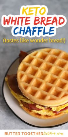 a white plate topped with a waffle sandwich