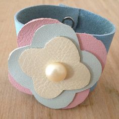 pastel leather pearl button cuff bracelet by RedHotYellowLeather Prom Light Blue, Pastel Leather, Graduation Flowers, Flower Cuff Bracelet, Flower Cuff, Wrist Flowers, Etsy Shop Names, Leather Flower, Pearl Leather