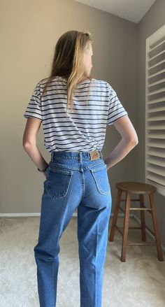 "beautiful vintage 80s jeans! regular fit. *these are mens but women of course should wear these! *tagged a 30x30- they have shrunk to a perfect 26x27 *waist total: 26\" *rise: 10\" *hips: 38\" *thigh: 11.5\" (total 23\") *inseam: 27\" *leg opening: 6\" (total 12\") * for a petite woman, or a very petite man No flaws, thick quality denim. 100% cotton. USA made. *Model is 5'8\" with a 25\" true waist **please measure and compare against jeans you own that fit well-- all sales are final- all measu Vintage Mid-rise Jeans For Everyday, Vintage Relaxed Fit Mid-rise Jeans, Vintage Medium Wash Tapered Leg Jeans, Vintage Medium Wash Mid-rise Jeans, 80s Jeans, Gauzy Dress, Lee Denim, Vintage Medium Wash Pre-washed Jeans, Denim Maxi Dress