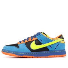 a blue and yellow nike dunster sneaker with an orange sole on the side