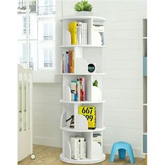 a white book shelf with books on it