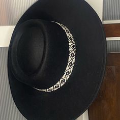 This Is A Great Cowgirl Hat. It Is Black With A Tan Strap. It Does Not Have Tag But Is New And Never Worn. Wear It As Is Or Decorate It To Be Your Own Style! Black Festival Hat, One Size, Black Festival Hat One Size Fits Most, Black Brimmed Hat Band One Size Fits Most, Black Brimmed Hat Band, Black Felt Hat For The Beach, Casual Black Hat Band For Festivals, Casual Black Fedora For Festivals, Black Festival Hat, Adjustable Black Boater Hat For Winter