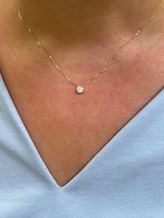 Our solitaire diamond necklace is so dainty and classic, perfect for everyday wear! Information: 💎 Sterling Silver (925 stamped) | 14K Gold Plated 💎 High-quality Cubic Zirconia diamond 💎 Carat: 0.25ct 💎 Adjustable: 16" - 18" 💎 Hypoallergenic 💎 Tarnish resistant This necklace looks amazing by itself or when layered; it's classy and great for daily use. It goes with any outfit and occasion.  Our necklace is adjustable, allowing you to find the perfect fit. This makes a great gift. Classic Diamond Necklace, Diamond Necklace Outfit, Gold Necklace With Diamond, Small Diamond Necklace, Daily Necklace, Single Diamond Necklace, Delicate Diamond Necklace, Solitaire Diamond Necklace, Diamond Necklace Simple