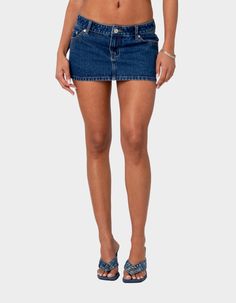 This Low-Rise Denim Micro Skirt Is The Ultimate Go-To Piece For All Your Spring/summer Plans. This Classic Staple Will Go With Everything In Your Closet, So You'll Never Be Left Wondering What To Wear. Micro Skirt. Front & Back Pockets. Front Zip & Button Closure. Low Rise Waist. Denim Fabric. 100% Cotton. Item Care: Wash With Similar Colors. Model Wears Size S. Model Height Is 5'7. | Edikted Spencer Low Rise Denim Mini Skirt Low Rise Denim Skirt, Denim Mini Skirt Outfit, Low Rise Skirt, Visionary Fashion, Micro Skirt, Jean Mini Skirts, Miniskirt Outfits, Summer Plans, Knitted Romper