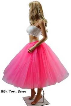 💞Please note that the ribbon around the waist is not included💞 Experience the enchantment of our exquisitely crafted Tutu Skirt, designed to bring out your inner elegance. This stunning skirt measures 30 inches in length, draping gracefully to create a captivating silhouette. Meticulously handmade, this tutu features strips of soft tulle delicately tied to a stretchy elastic band, ensuring a comfortable and adjustable fit. With over 30 different color options available, you can choose the perfect hue to match your style and occasion. Dance, twirl, and make a statement in our beautifully made Tutu Skirt. Its graceful design and versatility make it a perfect choice for special events, performances, costume parties, or adding a touch of whimsy to your everyday style. Step into the spotlight Tulle Skirt For Costume Party, Elegant Summer Petticoat For Costume Party, Spring Dance Petticoat, Long Skirt For Costume Party In Spring, Pink Full Skirt Bottoms For Wedding, Spring Long Skirt For Costume Party, Long Skirt For Spring Costume Party, Elegant Summer Skirt For Costume Party, Pink Fitted Tulle Maxi Skirt