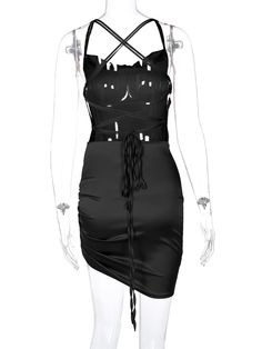 a mannequin wearing a black dress with straps