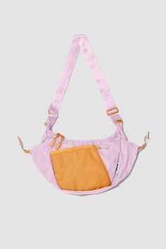 Introducing Crescent Crossbody, designed with lightweight, technical materials, geometric functionality, and intuition. Volume: 4.7 Liters Size: H 8.5in x W 12.2in x D 2.8in Strap length: 59in Shell: 210D recycled nylon N66 baby ripstop Lining: 75Dx150D recycled poly ripstop Versatile Purple Nylon Shoulder Bag, Pink Nylon Outdoor Bag, Pink Nylon Bags For Outdoor, Casual Pink Bags With Functional Pockets, Pink Nylon Shoulder Bag For Outdoor, Pink Nylon Shoulder Bag For Sports, Purple Nylon Bags, Pink Nylon Sports Shoulder Bag, Nylon Crossbody Shoulder Bag For Sports