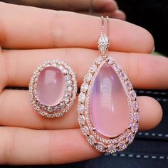 Welcome to Elegant Art Jewelry!  Stone: Natural Rose Quartz Stone Size: ( 10mm×14mm Ring ), ( 13mmx25mm Pendant ) Side Stone: Zircon Metal: 925 Sterling Silver Personalization: 9K/14K/24K/GOLD/SILVER/PLATINUM/ROSE-GOLD/WHITE GOLD. (Contact me)  Rose Quartz Pendant, Rose Quartz Cuff Pendant, 925 Sterling Silver Pendant, Oval Shape Pendant, Rose Quartz Pendant, Rose Quartz Engagement, Open Design Pendant, Rose Quartz Oval, Rose Quartz Natural, Pink Rose Quartz, Pink Rose Quartz, Gemstone Pendant, Rose Gold Cabochon Pendant Jewelry, Pink Cabochon Jewelry For Wedding, Pink Cabochon Jewelry For Anniversary, Pink Cabochon Jewelry For Formal Occasions, Pink Cabochon Wedding Jewelry, Fine Jewelry Pink Cabochon, Round Mother's Day Jewelry With Rose Design, Mother's Day Round Jewelry With Rose Design, Mother's Day Round Rose Design Jewelry