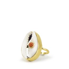 A reminder that sunny days are on the horizon, this stunning ring is carefully handmade from 18k gold over sterling silver wrapping a white cowrie shell marked with a pretty coral bead. Style it with similar styles from the Marina collection. Presented in a Vintouch signature packaging. Handmade from 18-karat Yellow Gold Over Sterling Silver (1-micron plating).   We suggest to avoid contacts with soaps, detergents, chlorine and any other chemical substance that could alter the original character Summer Beach Jewelry Ring, Beach Summer Jewelry Ring, Gold Rings As Summer Gift, Summer Beach Ring Jewelry, Gold Rings For Summer Gift, Summer Gift Gold Rings, White Shell Rings For The Beach, White Shell Rings For Beach, Elegant Adjustable Rings For Beach