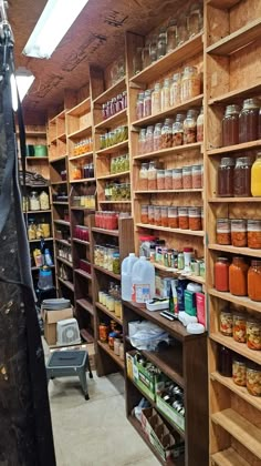 a store with shelves filled with lots of different types of jars and condiments