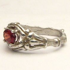 "Handmade Solid Sterling Silver Red Garnet Bone Ring 6x4mm .5ct Sizing and shipping is ALWAYS FREE with a 14 day \"No Questions Asked\" return policy. *In the notes section of your order, please specify ring size.* This ring is made with real gems. I made it myself, so if you see a setting you like and want a different gem in it, I can put in another one as they are not finished. I can probably do it for the same price or real close. I can make these either in gold or sterling silver; just email Classic Lab-created Ruby Jewelry For Promise, Classic Promise Jewelry With Lab-created Ruby, Classic Red Jewelry For Promise, Red Solitaire Ring For Promise, Red Birthstone Ring With Prong Setting For Promise, Red Solitaire Promise Ring, Classic Solitaire Ruby Ring As Gift, Classic Red Promise Ring, Classic Rings With Lab-created Ruby For Gift