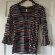 This Is A Striped Metallic Free People Shirt. It Has Mid Length Bell Sleeves And A Fitted Body. Size Medium. New Without Tags. Casual Bell Sleeve Blouse For Fall, Fall Stretch Tops With Bell Sleeves, Stretch Bell Sleeve Tops For Fall, Striped V-neck Top For Fall, Fall Striped V-neck Top, Multicolor Bell Sleeve Casual Tops, Casual Multicolor Bell Sleeve Tops, Striped V-neck Blouse For Fall, Fall Striped V-neck Blouse