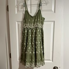 Boho Skater Girl Dress, Olive Green With White Floral Detailing. Adjustable Straps.Never Worn Whimsical Dress Casual, Red Lace Cocktail Dress, Boho Summer Dress, Cocktail Dress Short, Skater Girl Dress, Cross Front Dress, Dress Olive Green, Whimsical Dress, Floral Ruffle Dress