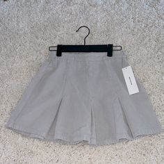 Grey/Gris Corduroy Skirt Urban Outfitters (Never Worn) High Waist Cotton Tennis Skirt For School, Short Cotton Tennis Skirt For School, Pleated Cotton Skort For School, Cotton Pleated Skort For School, School Mini Skirt With Pockets, School Fitted Cotton Mini Skirt, Cotton School Skirt Short Length, High Waist Cotton Pleated Skirt For School, High Waist Tennis Skirt For School In Spring